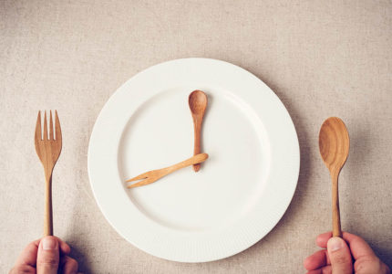 white plate with spoon and fork, Intermittent fasting concept, k